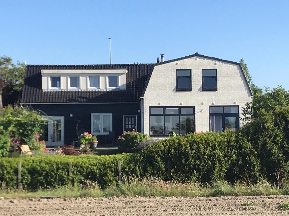 T Huuske Tuinappartement Met Fantastisch Uitzicht, Nabij Zee Zonnemaire Exterior foto