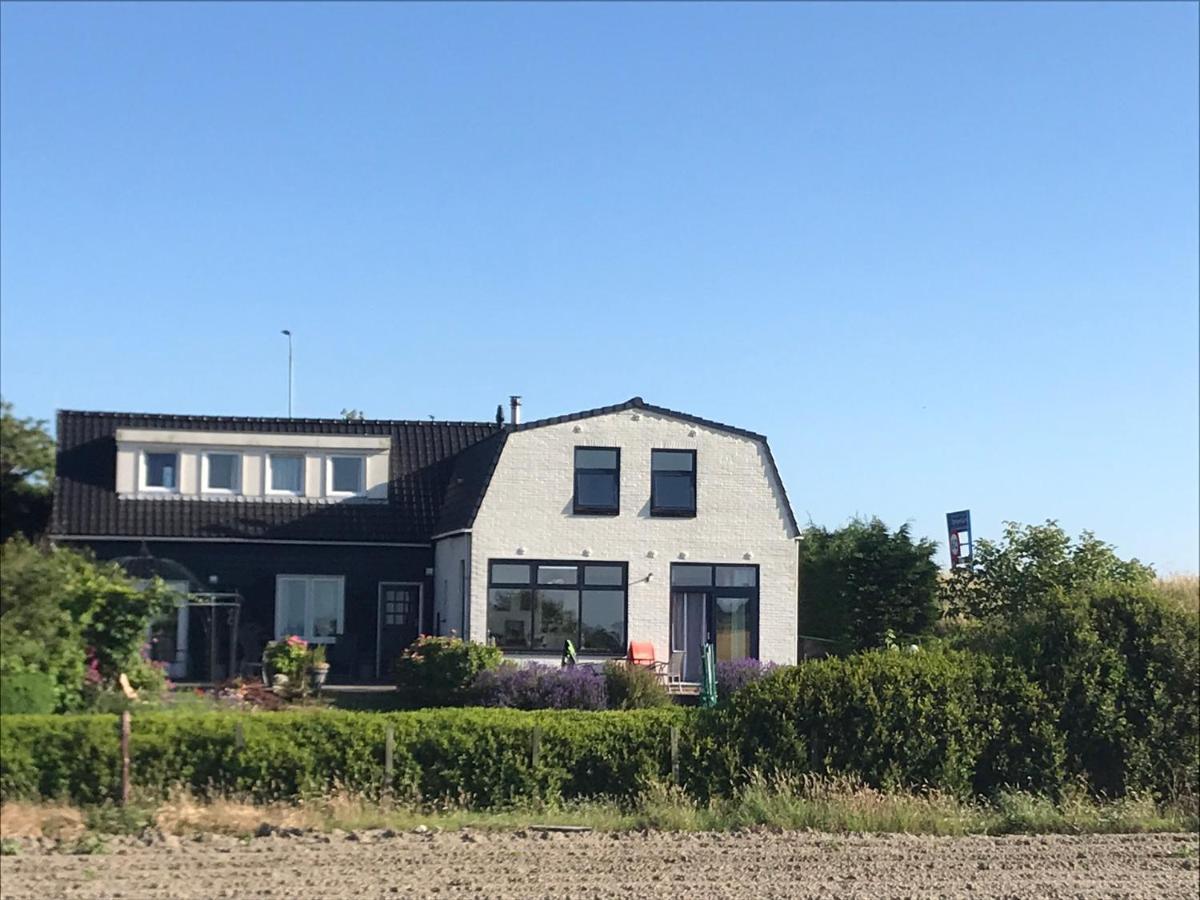 T Huuske Tuinappartement Met Fantastisch Uitzicht, Nabij Zee Zonnemaire Exterior foto